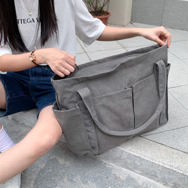 キャンバストート ゆとりポケット付き 多機能トートバッグ