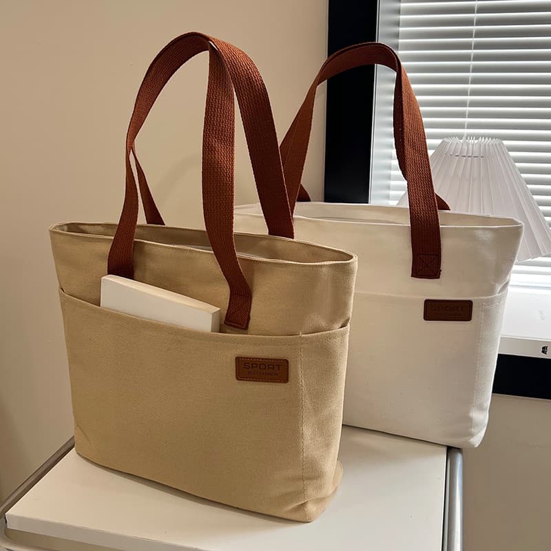 キャンバストート シンプル外ポケット付き帆布バッグ
